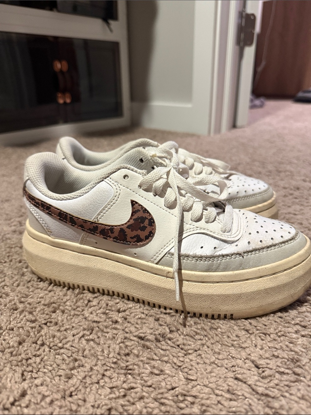 Nike White Platform Sneakers with Brown Leopard Swoosh Accent